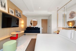 Dettaglio camera Comfort Tripla con letto matrimoniale e divano letto Hotel Milu Milano